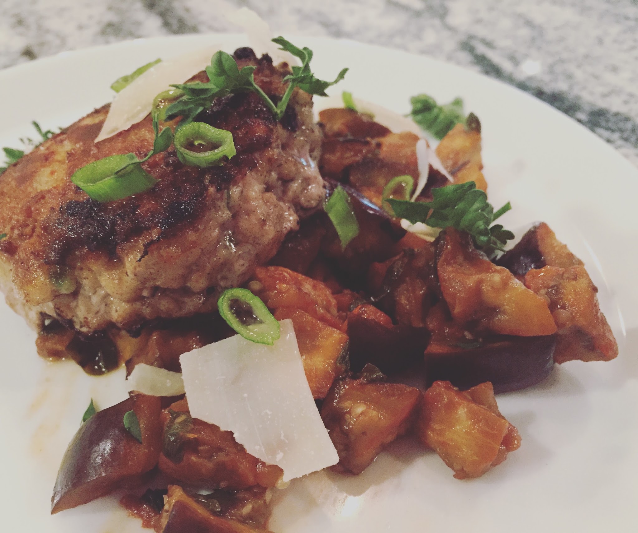 veal cakes over silky eggplant