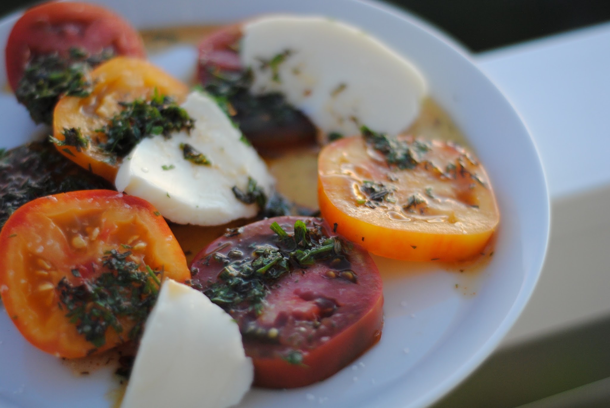 carrot green chimichuri sauce… with tomatoes