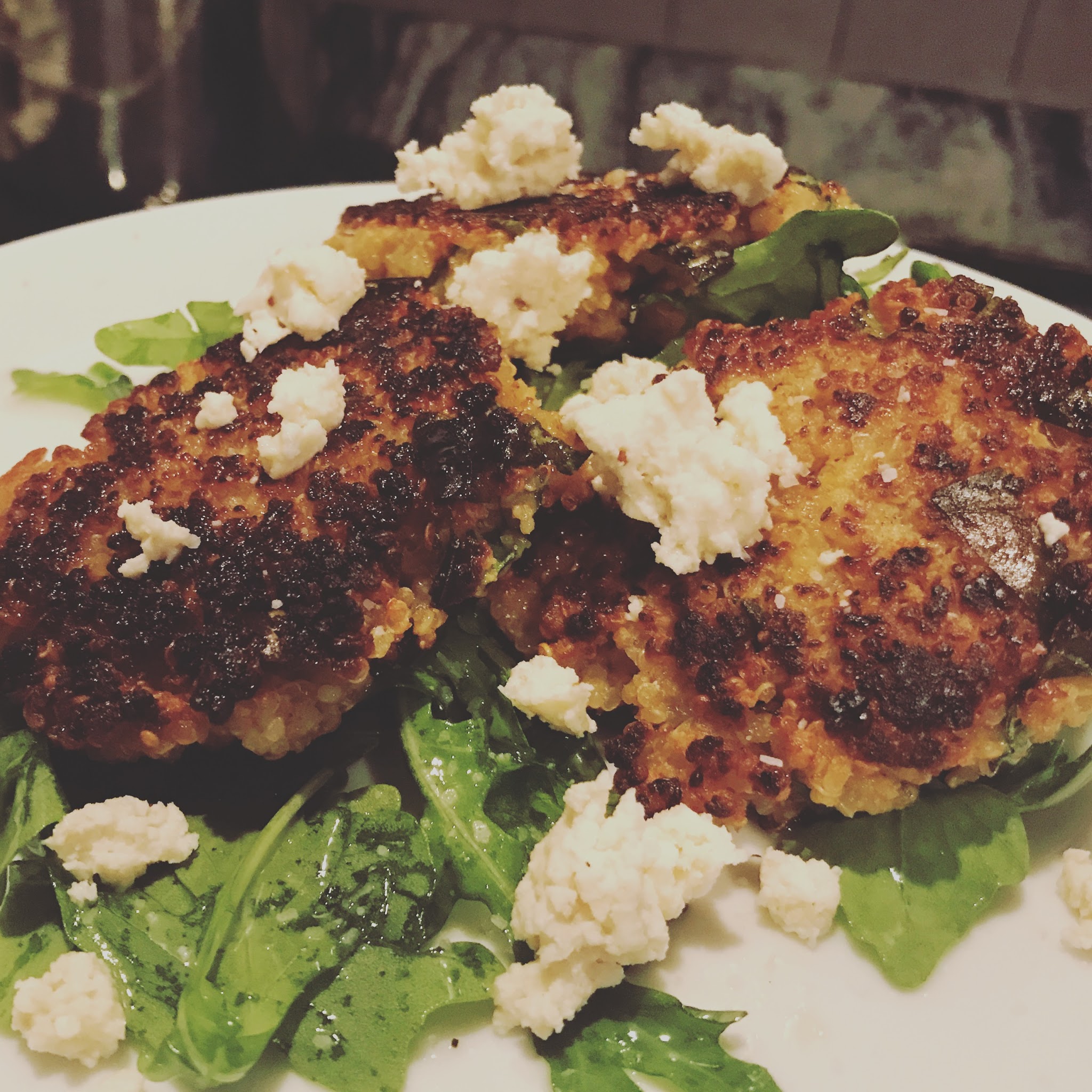 basil thyme quinoa cakes over arugula with fig honey goat cheese