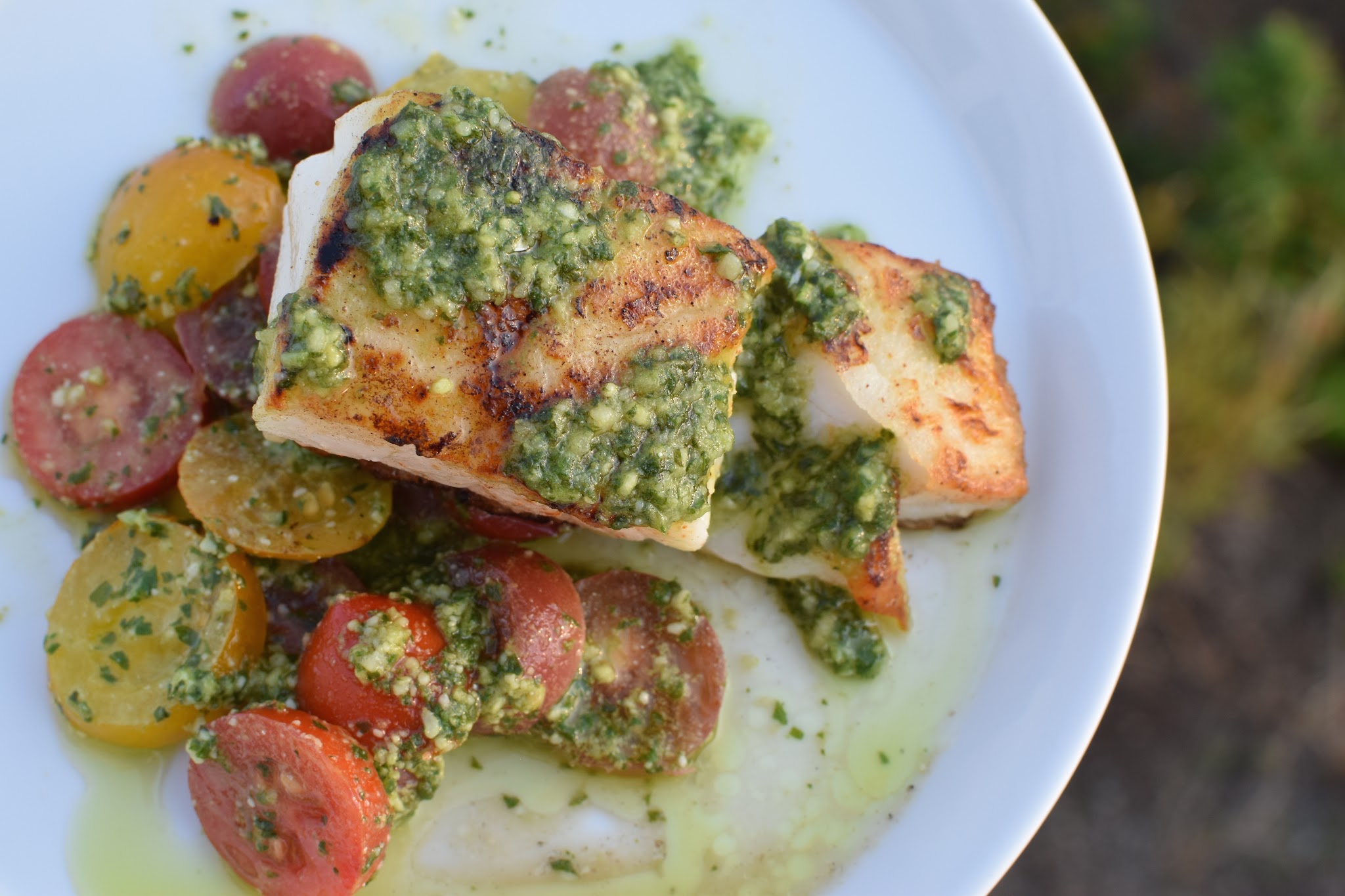 Cod with basil mint pesto and garden tomatoes