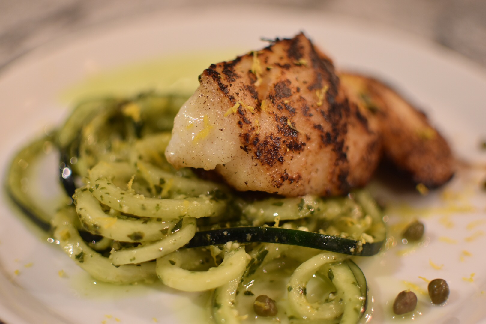 Parmesan seared cod with pesto zucchini and lemon zest — image 2