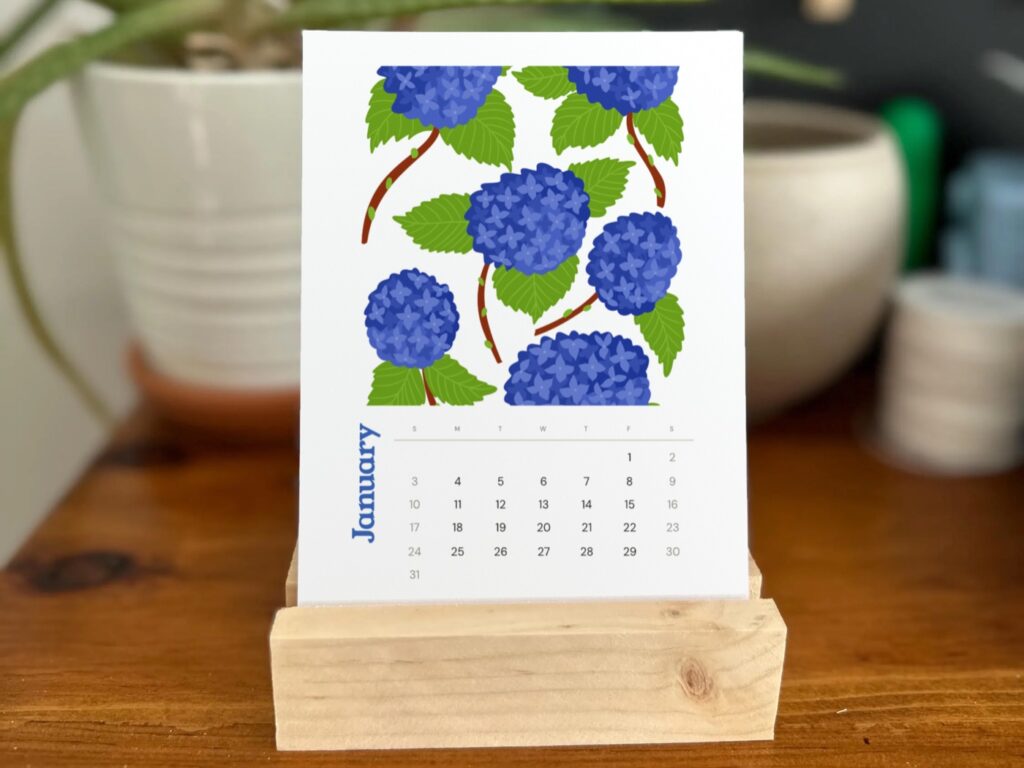 Hydrangea desk calendar on a wooden stand